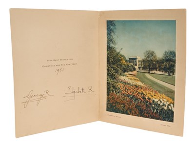 Lot 19 - T.M.King George VI and Queen Elizabeth, scarce signed 1951 Christmas card with gilt embossed crown to cover, colour photograph of Buckingham Palace and garden taken in Spring 1950. Signed in ink '...
