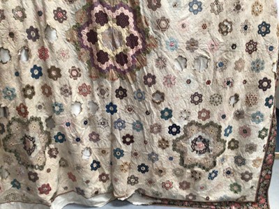 Lot 2144 - 19th century hexagon patchwork quilt with chintz border, cotton lining.