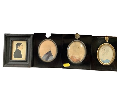 Lot 2635 - Four 19th century watercolour portrait miniatures on paper (three in lacquered frames)