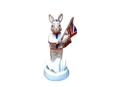 Lot 1288 - Rare Royal Doulton Bunnykins figure - England Athlete holding the Union Jack Flag, marked The Property of Royal Doulton Tableware Ltd, Not Produced For Sale, boxed