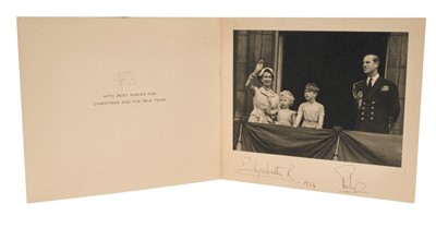 Lot 29 - H.M.Queen Elizabeth II and H.R.H.The Duke of Edinburgh, scarce signed 1954 Christmas card with gilt embossed crown to cover, black and white photograph of the Royal couple with a young Prince Charl...