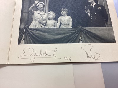 Lot 29 - H.M.Queen Elizabeth II and H.R.H.The Duke of Edinburgh, scarce signed 1954 Christmas card with gilt embossed crown to cover, black and white photograph of the Royal couple with a young Prince Charl...