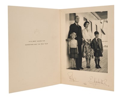 Lot 30 - H.M.Queen Elizabeth II and H.R.H.The Duke of Edinburgh, scarce signed 1956 Christmas card with gilt embossed crown to cover, black and white photograph of the Royal couple with a young Prince Charl...