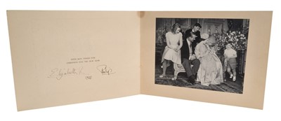 Lot 38 - H.M.Queen Elizabeth II and H.R.H.The Duke of Edinburgh, scarce signed 1964 Christmas card with gilt embossed Royal cyphers to cover,  photograph of the Royal Family on the Christening of Prince Edw...