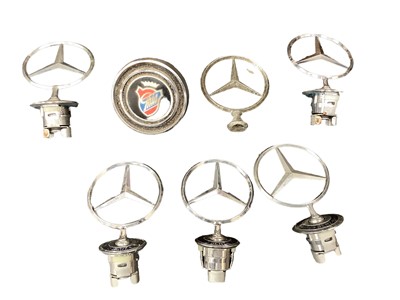 Lot 2165 - Group of six Mercedes - Benz 3 pointed star bonnet mascots together with a Ghia badge (7).