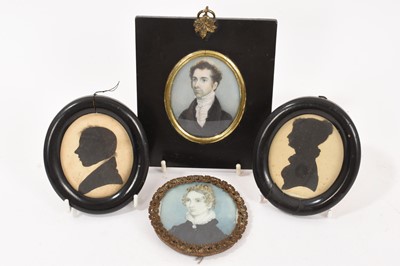 Lot 738 - Pair of early 19th century portrait miniatures on ivory, and a pair of silhouettes