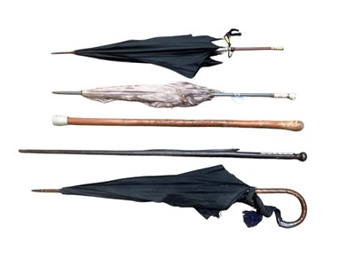 Lot 2441 - Group of umbrellas and walking sticks, including silver and porcelain topped examples, Japanese stick, etc