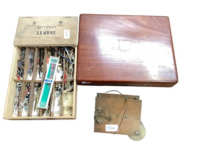 Lot 2448 - Box of photography related items, an antique oil lamp, a clock movement, a box of clock parts and a mahogany box