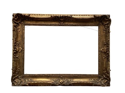 Lot 1245 - Late Victorian gilt picture frame with foliate scroll mouldings, rebate 62cm x 92cm