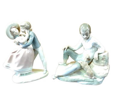 Lot 1304 - Two Lladro porcelain figures - Precious Love and Boy with dog