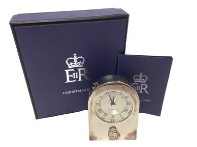 Lot 58 - H.M.Queen Elizabeth II, Royal Household 2005 Christmas present, silver plated bed side alarm clock with applied Royal cypher to case and presentation inscription to the dial, quartz movement in ori...