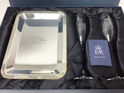 Lot 60 - H.M.Queen Elizabeth II, 2007 Royal Household Christmas gift of a pair glass champagne flutes and silver plated tray each engraved with Royal cyphers in original box with Royal cypher to lid with ca...