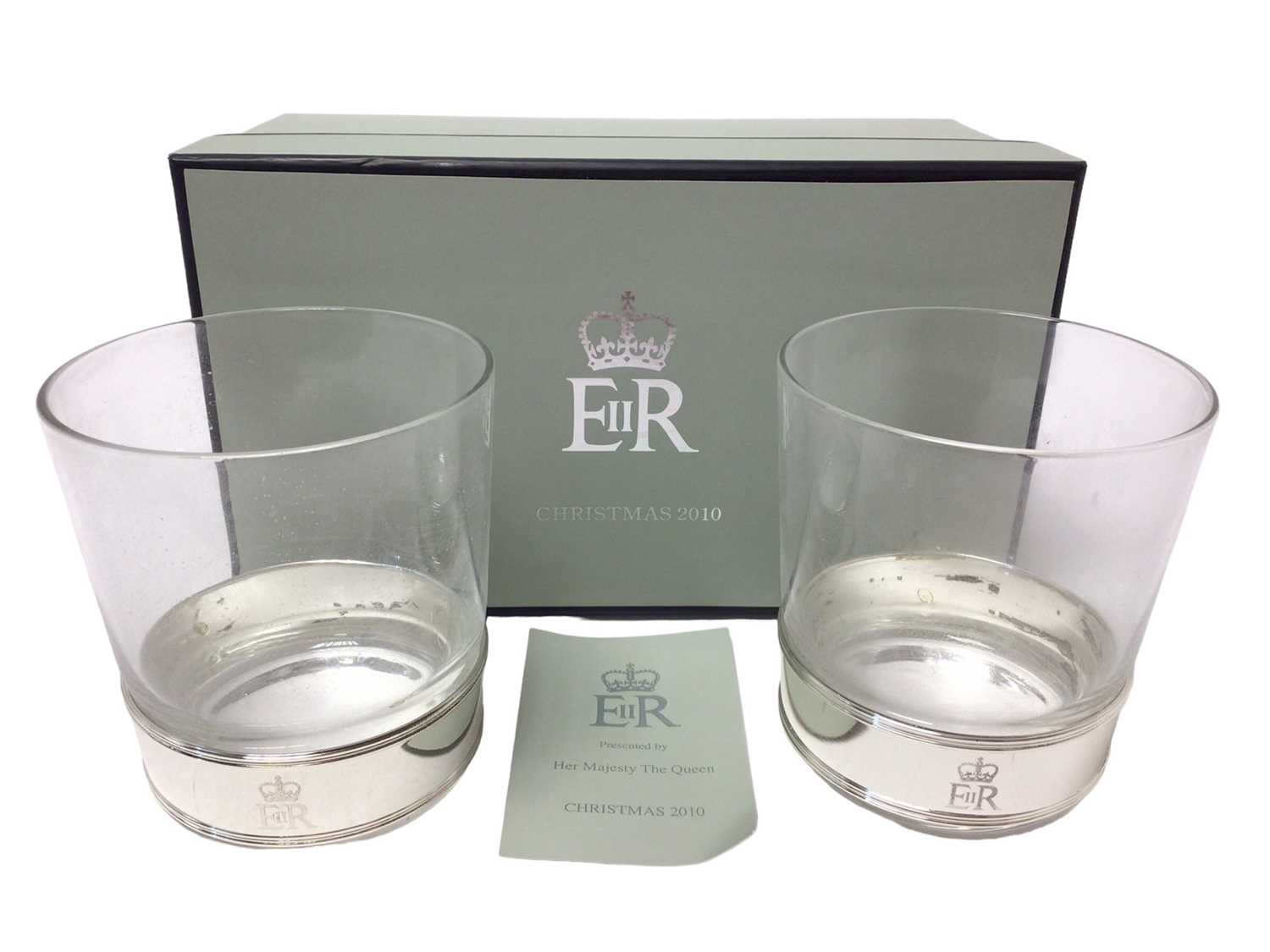 Lot 63 - H.M.Queen Elizabeth II, 2010 Royal Household Christmas present of pair glass beakers with silver plated collars engraved with the Royal cypher in original fitted box with card