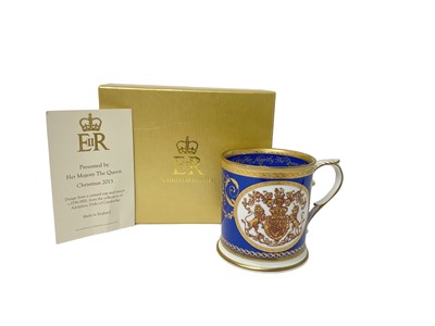 Lot 66 - H.M.Queen Elizabeth II, 2013 Royal Household Christmas present China mug decorated with Royal Arms and 'Presented by Her Majesty The Queen Christmas 2013' in fitted box with card