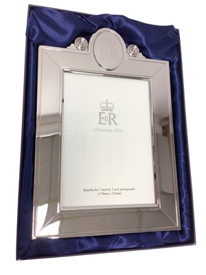 Lot 68 - H.M.Queen Elizabeth II, 2016 Royal Household Christmas present Silver plated easel photograph frame with etched crowned ERII cipher to cresting 28x19cm in original fitted box with card