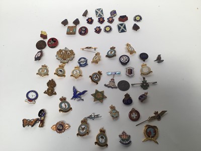 Lot 2692 - Selection of enamel badges including Daily Express Rupert, Butlins, Golden Shred Golfer, RAF, Army etc.