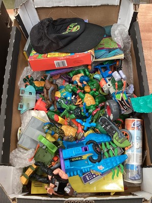 Lot 1773 - A box of 1989/90 Teenage mutant hero turle toya incudinf Shredder Jetski Boat Sewer Dragater, Sewer Cycle and Sidecar, figures, accessories and merchandise. Plus an accumulation of Mini Boggins and...