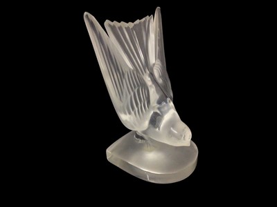 Lot 230 - Lalique model of a swallow, signed 'Lalique France' to base, 15.5cm high