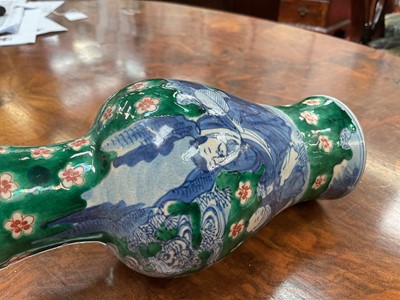 Lot 260 - Near pair of Chinese crackle glaze vases, decorated in underglaze blue with figures on a green and iron red ground, Kangxi marks but later, 18cm and 19cm high