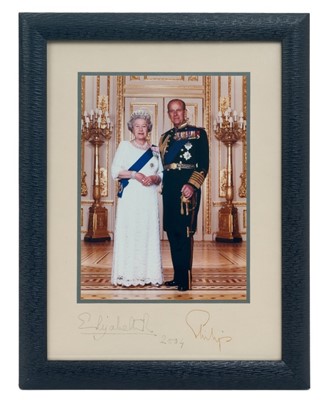 Lot 90 - H.M.Queen Elizabeth II and H.R.H. The Duke of Edinburgh, fine signed presentation portrait photograph of the Royal couple taken at Buckingham Palace, signed in ink 'Elizabeth R 2004 Philip' in orig...