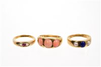 Lot 406 - Three Victorian gold rings - to include a pink...