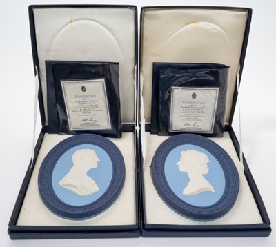 Lot 92 - Pair Wedgwood blue jasperware commemorative plaques depicting busts of H.M.Queen Elizabeth II and H.R.H.The Duke of Edinburgh commemorating their Silver Jubilee 1977, limited edition 425/500, 22.5...