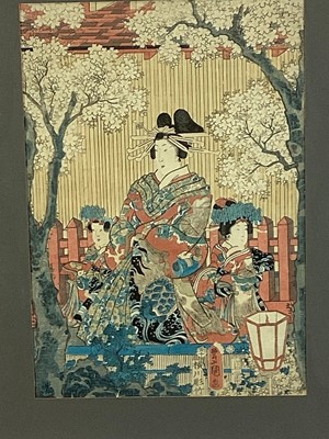 Lot 190 - Two antique Japanese coloured woodblocks depicting figures, 36cm x 25cm, in glazed frames