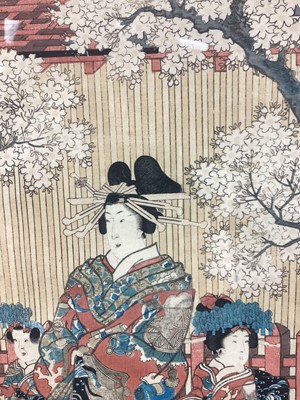 Lot 190 - Two antique Japanese coloured woodblocks depicting figures, 36cm x 25cm, in glazed frames