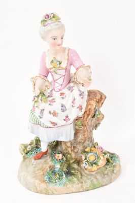 Lot 72 - Continental porcelain figure of a girl with flowers, circa 1890