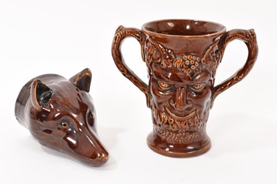 Lot 46 - Two treacle-glazed pottery items