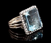 Lot 411 - Fine aquamarine and diamond cocktail ring, the...