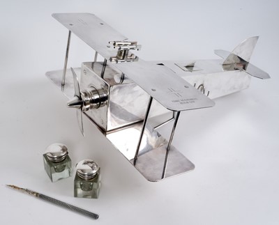 Lot 814 - Novelty silver plated model of a German Bi-Plane desk companion by F. Reichenburg, Germany