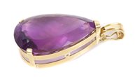 Lot 412 - Large amethyst single stone pendant, the pear...