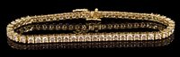 Lot 413 - Diamond tennis bracelet, the articulated gold...