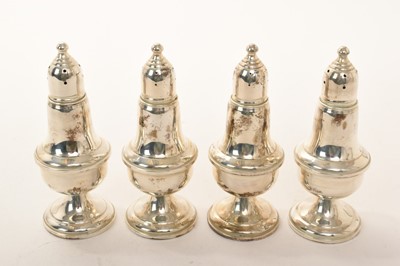 Lot 359 - Set of four contemporary American Sterling silver casters of baluster form