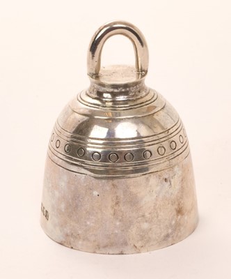 Lot 365 - Edwardian silver table bell of domed form, with engraved decoration and loop handle