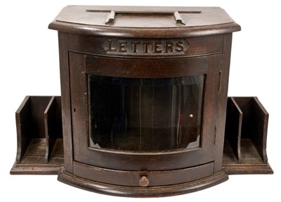 Lot 850 - Early 20th century carved oak letter box