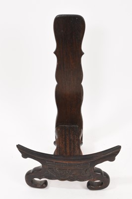 Lot 834 - Chinese carved hardwood plate stand, 30cm high