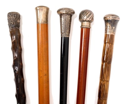 Lot 840 - Five various 19th century silver mounted walking sticks