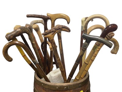 Lot 839 - Large collection of walking sticks, including novelty and root sticks, 19th century