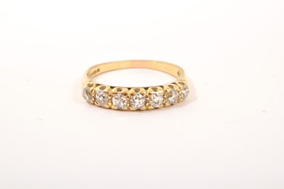 Lot 571 - Diamond half hoop eternity ring with seven old cut diamonds estimated to weigh approximately 0.75cts in 18ct yellow gold setting, ring size N½.