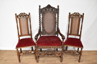 Lot 1241 - William and Mary style walnut armchair with caned back and seat, together with a pair of side chairs, each with loose velvet cushion (3)