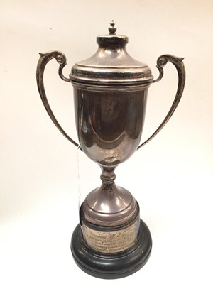 Lot 1042 - Silver two handled trophy with cover on stand