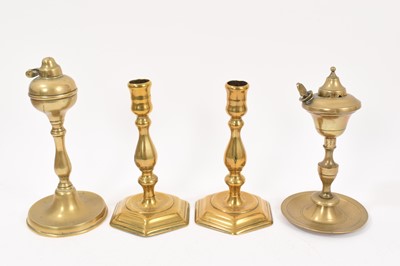 Lot 863 - Pair of mid 18th century brass candlesticks together with two Georgian lamps