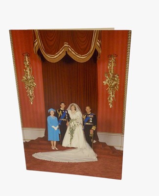 Lot 138 - H.M.Queen Elizabeth II and H.R.H. The Duke of Edinburgh, signed 1981 Christmas card with colour photograph of the 1981 Royal Wedding to the cover, Royal cyphers to the interior and signed in ink '...