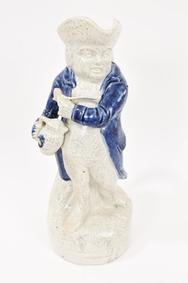 Lot 308 - Unusual 19th century 'Hearty Good Fellow' toby jug, salt-glazed with an under-glaze blue coat, 28.5cm high