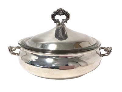 Lot 56 - Contemporary American silver plated, twin handled, dish of circular form, with domed cover