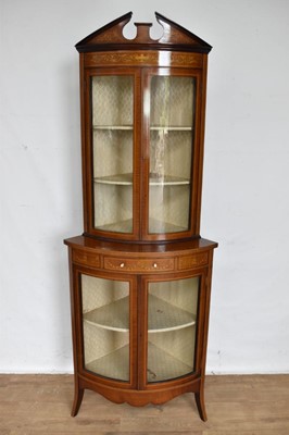 Lot 1110 - Edwardian figured mahogany and swag inlaid two height bowfront corner cabinet