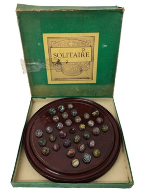 Lot 854 - Collection of 32 antique German latticino marbles with large vintage solitaire board