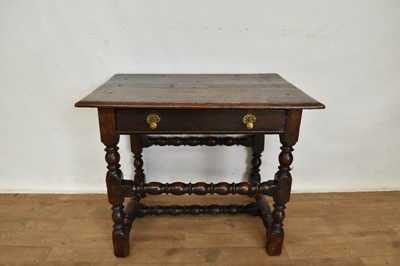 Lot 1114 - Charles II oak single drawer side table